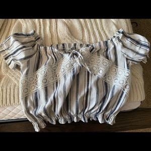 Large navy and white crop top.